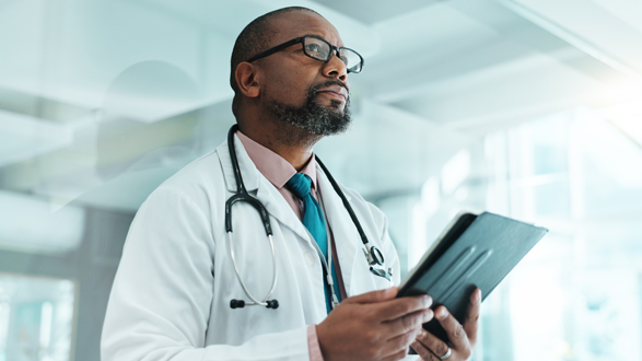 Thinking, black man and doctor with tablet at clinic for medical research, Telehealth and surgery schedule. Male surgeon, planning and digital with history report, patient information and diagnosis