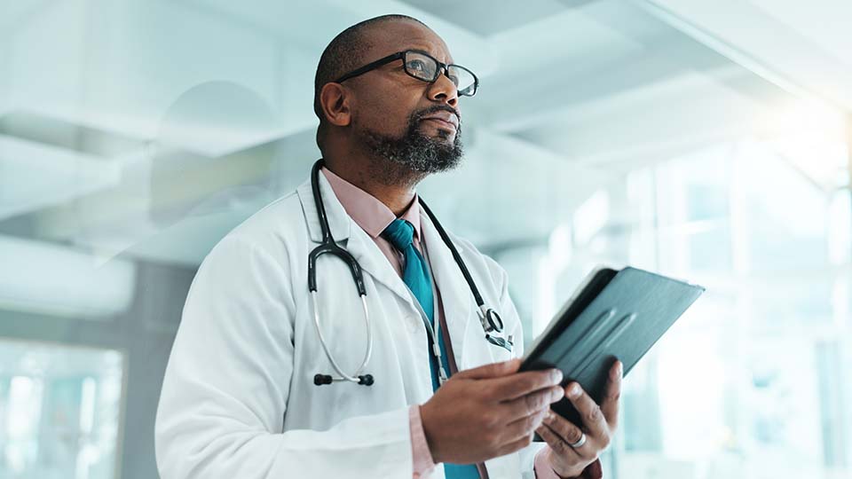 Thinking, black man and doctor with tablet at clinic for medical research, Telehealth and surgery schedule. Male surgeon, planning and digital with history report, patient information and diagnosis