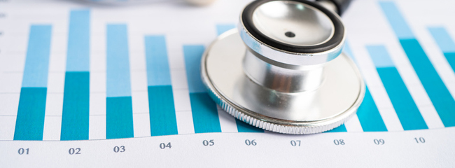 Stethoscope on charts and graphs spreadsheet paper, Finance, Account, Statistics, Investment, Analytic research data economy and Business company concept.